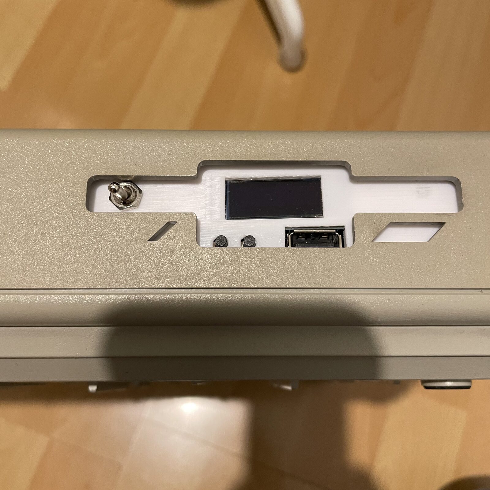 The relocated TOS switcher at the front of the Gotek case